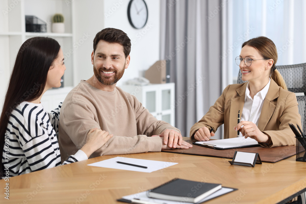 Couple having meeting with lawyer in office Couple having meeting with lawyer in office