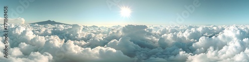 Expansive Cloud Panorama with Sunlight Peering through, a Perfect Wide Angle Scene for Backgrounds and Nature Enthusiasts