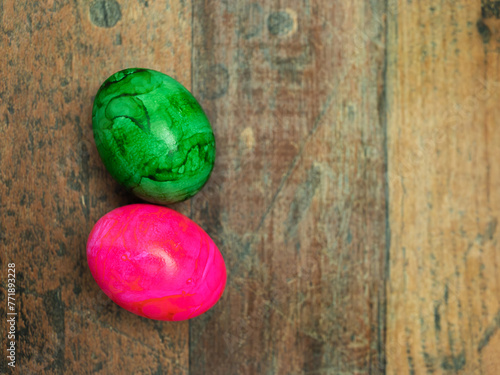 Colorful Easter Eggs on Rustic Wooden Background