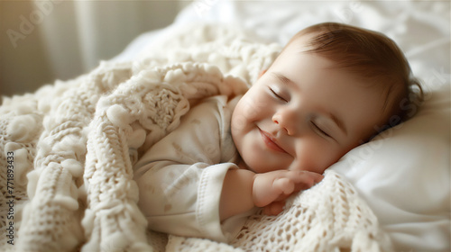 Adorable baby sleep while smile in minimalist white soft pillow and blanket