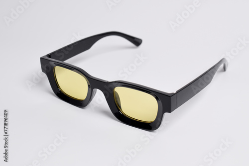 Stylish vintage sunglasses on white background