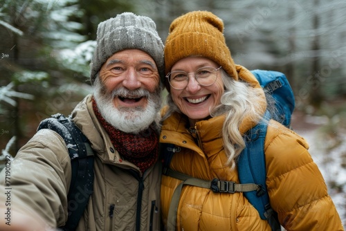 Wonderful sincere and cheerful pair of white-haired mature smiling people selfie on their mobile phones. Enjoy life. Pay attention to the health of the elderly  © SHI