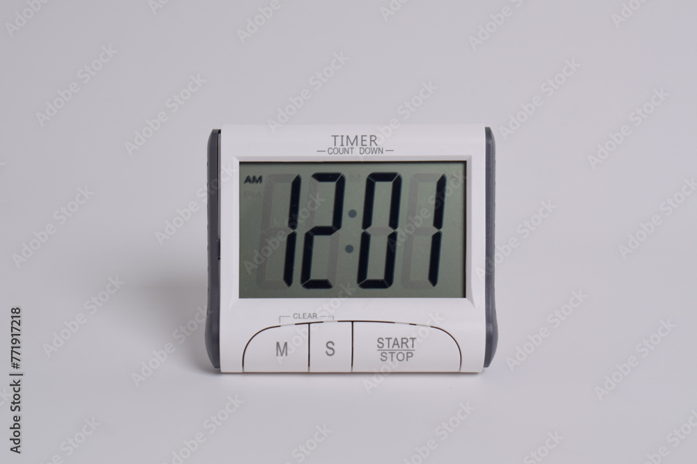 Digital kitchen timer on white background. Mini Digital counter timer kitchen alarm clock, count down clock for cooking Digital kitchen timer on white background. Mini Digital counter timer kitchen alarm clock, count down clock for cooking