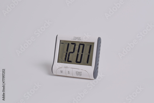 Digital kitchen timer on white background. Mini Digital counter timer kitchen alarm clock, count down clock for cooking