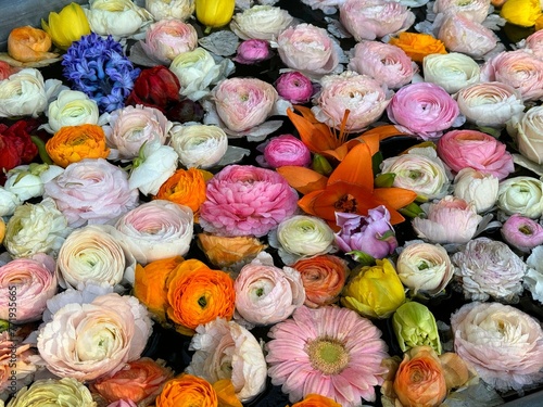 Beautiful flowers roses, lily, hyacinth, ranunculus, herbera pink white yellow petals. 