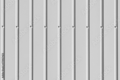 White galvanized iron metal fence with bolts abstract texture background wall steel
