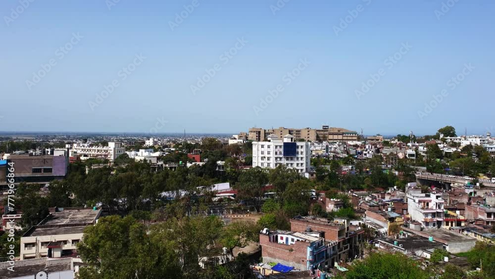Architecture beautiful building cloudy blue sky flying birds in background in a small city. Architecture beautiful building cloudy blue sky flying birds in background in a small city.