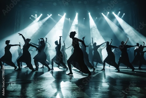 A dynamic shot capturing a group of people enthusiastically dancing on a stage during a performance photo