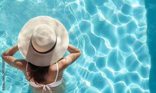 Top view of beautiful woman earing sunhat relaxing in swimming pool , Generative AI