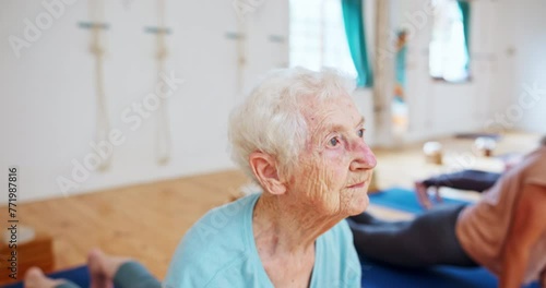 Elderly woman, stretching and yoga with class for pilates, spiritual wellness or balance together. Senior people, yogi and coaching in zen, fitness or svanasana pose for awareness or indoor exercise photo
