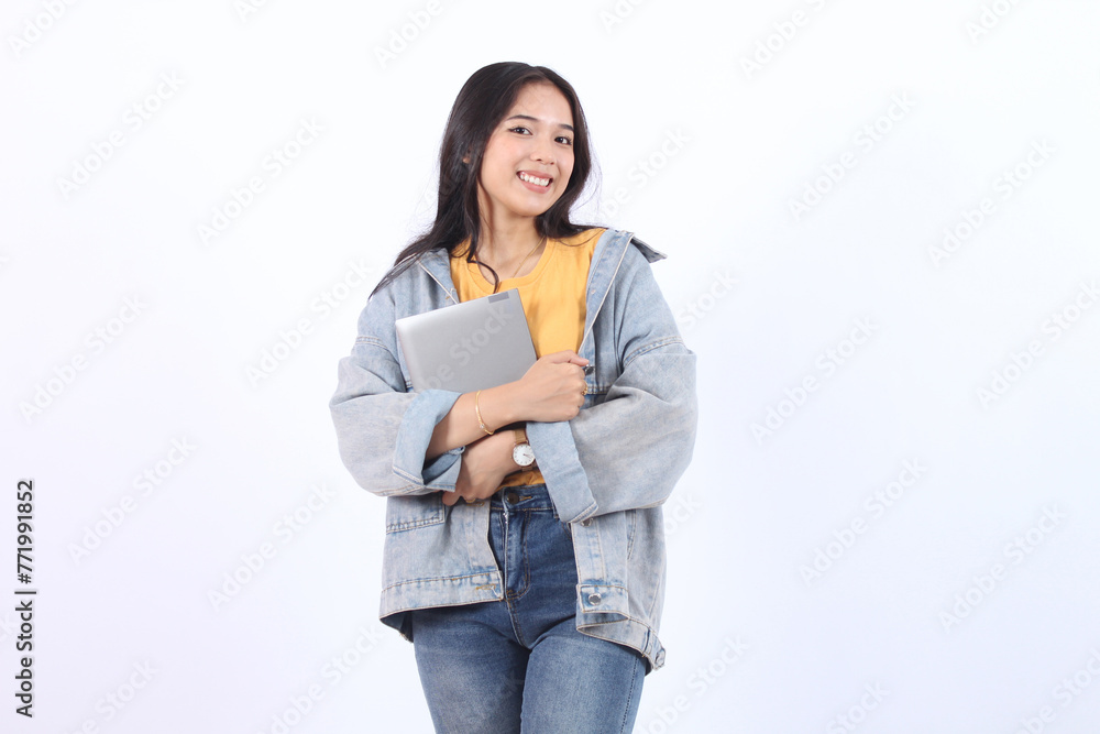 Smart pretty young Asian woman using digital tablet, confidently winning the prize standing isolated white studio background Smart pretty young Asian woman using digital tablet, confidently winning the prize standing isolated white studio background