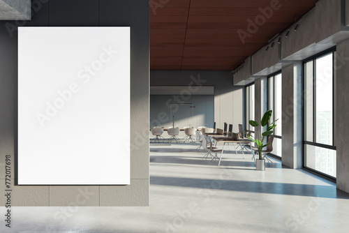 Modern coworking office interior with empty white mock up banner  furniture  windows and equipment. Workplace concept. 3D Rendering.