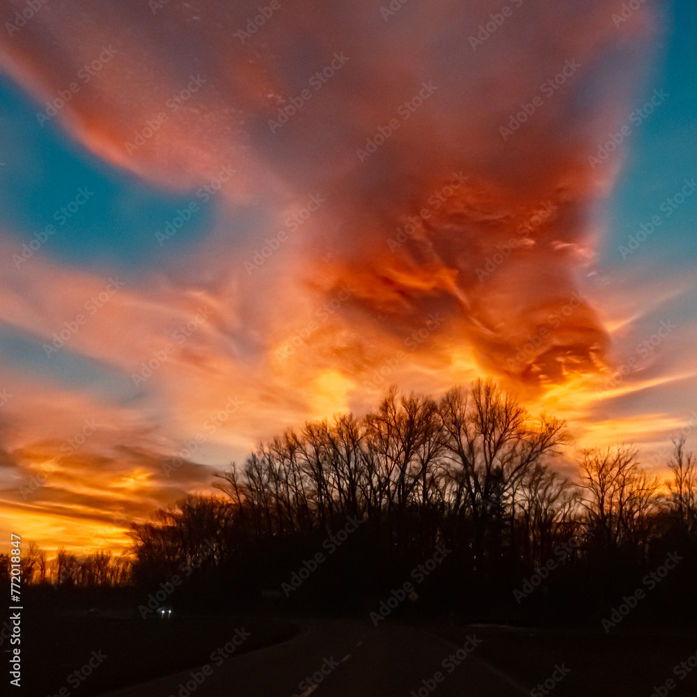 Sunset with dramatic clouds near Plattling, Isar, Deggendorf, Bavaria, Germany Sunset with dramatic clouds near Plattling, Isar, Deggendorf, Bavaria, Germany