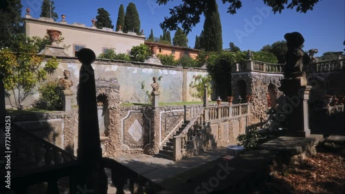 Italian Court. Villa. Manor house. Grechinsky yard. Old Town. Old streets. Historical buildings. Square. Yard. Italian monuments. Pinia. Coniferous trees. Summer. Classical Italian style. Elements of