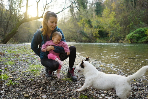 mother and child walking dogs