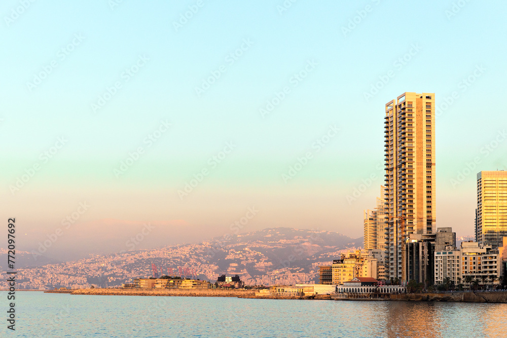 Fototapeta premium Sunset in the city of Beirut. Evening view of the bay and buildings
