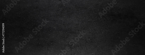 Dark black concrete wall background or texture photo