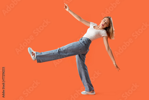 Young woman in stylish jean...