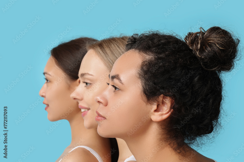 Beautiful young women on blue background Beautiful young women on blue background