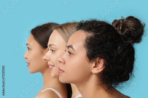 Beautiful young women on blue background