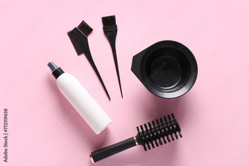 Set of professional hairdresser's tools on pink background Set of professional hairdresser's tools on pink background