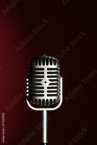 Retro microphone on dark background, closeup