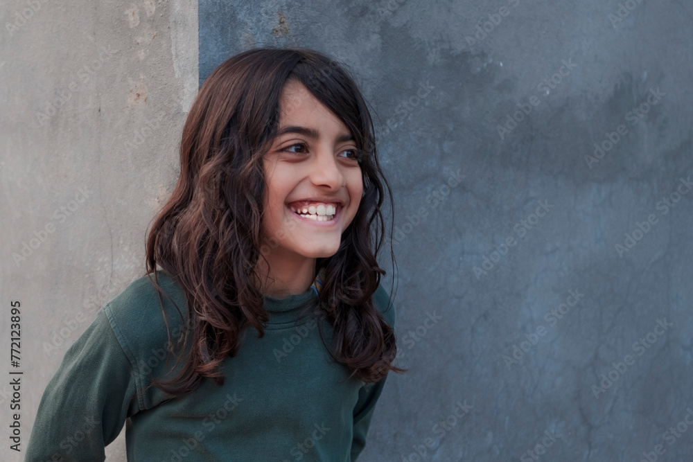 portrait of a middle eastern boy with long hair portrait of a middle eastern boy with long hair