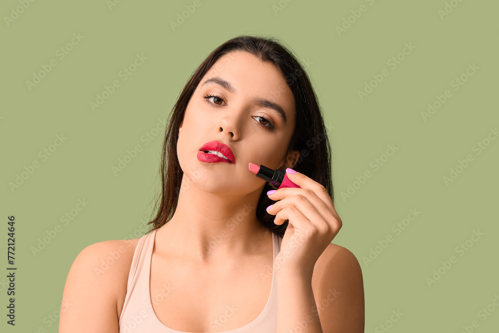 Beautiful young woman with stylish lipstick on green background Beautiful young woman with stylish lipstick on green background