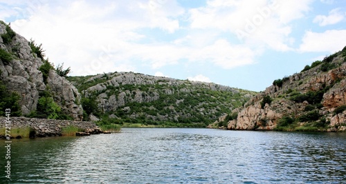 view while boating the Zrmanja river inland starting from Obrovac , Croatia