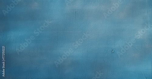 Photo of A bluecolored paper texture background with subtle grain and natural feel. Web banner with copyspace on the right --ar 128:67 --v 5.2 Job ID: d291391f-e068-4f6b-8ce1-3d03329d30f3 photo