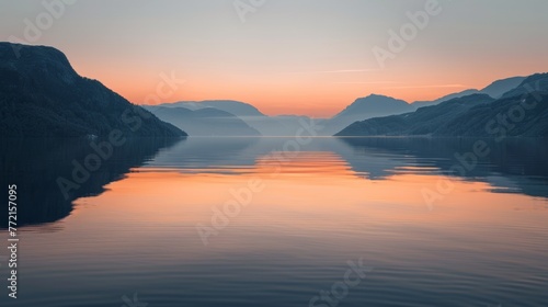 A view of a sunset over the water with mountains in the background  AI