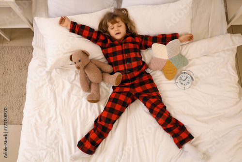 Adorable little girl with t...