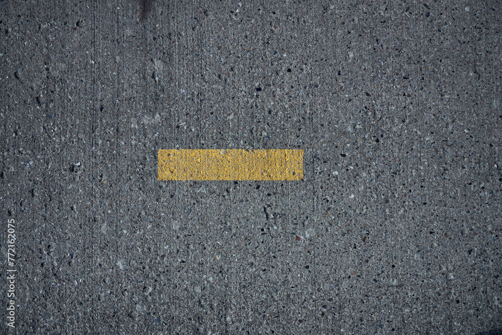 Fototapeta premium yellow marking on asphalt
