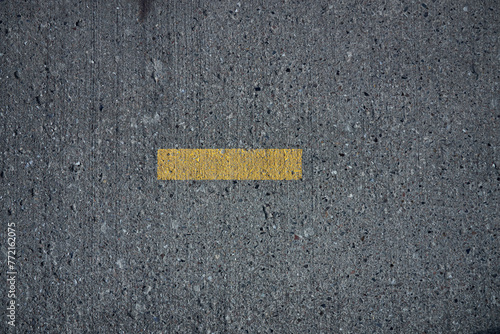yellow marking on asphalt