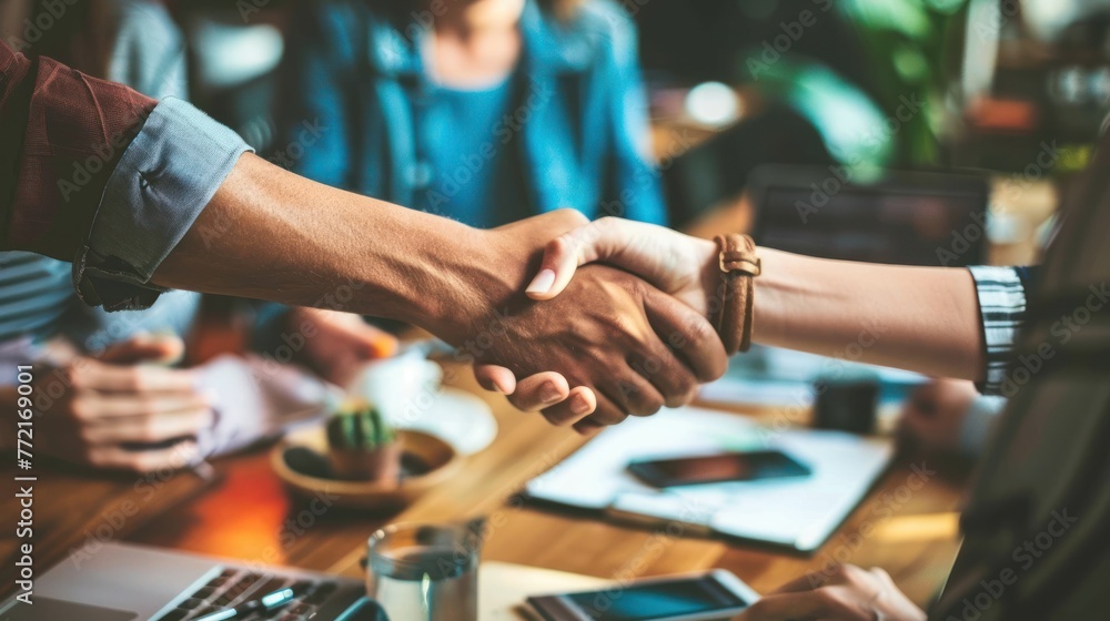 Business people shaking hands, finishing up a meeting