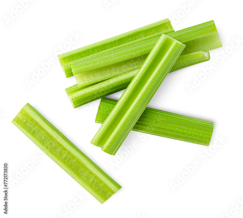chopped celery stalks on isolated white background, top view