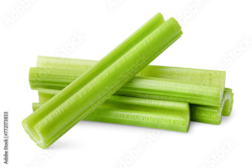 chopped celery stalks on isolated white background, front view