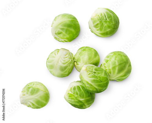 scattered Brussels sprouts on isolated white background, top view