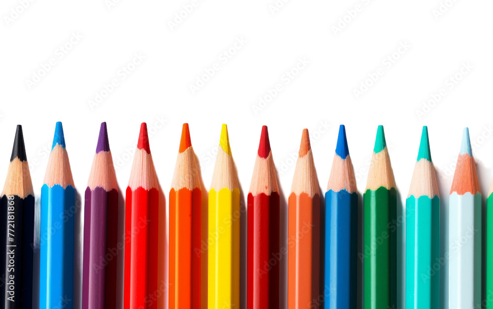 A colorful array of pencils arranged in a perfect row against a pristine white backdrop A colorful array of pencils arranged in a perfect row against a pristine white backdrop