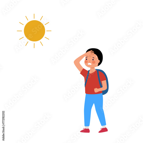 Boy child suffering from heat wave stoke in very hot weather temperature. Sweaty student kid feel tired under strong sunlight.