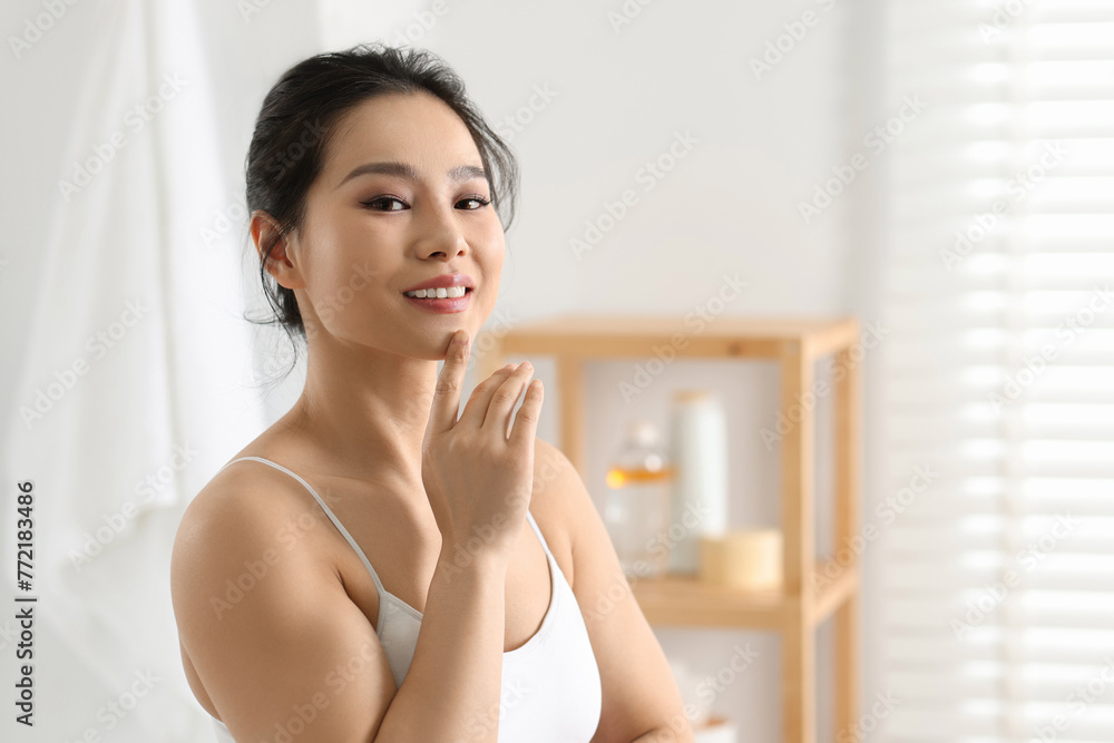 Portrait of beautiful woman with perfect skin indoors, space for text Portrait of beautiful woman with perfect skin indoors, space for text