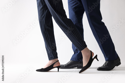 Businesswoman and businessman on white background, closeup