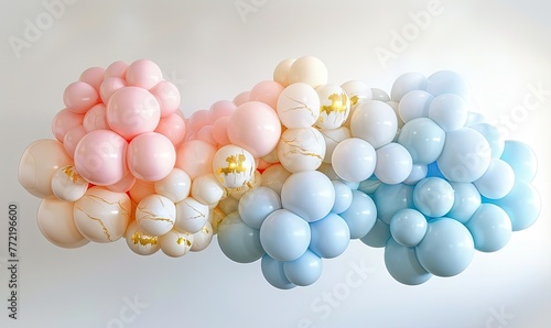 A cluster of balloons in various shades of pastel colors, including pink, peach, cream, and blue, creating a visually pleasing and whimsical arrangement.
