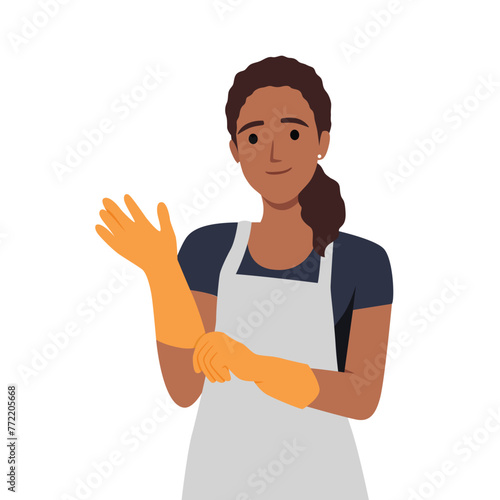 Work clothes and accessories concept. Young woman doctor or cosmetologist putting white latex protective medical gloves