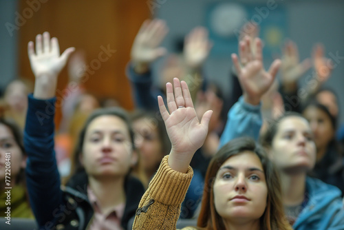 Seminar women group raising up hand for asking the speaker