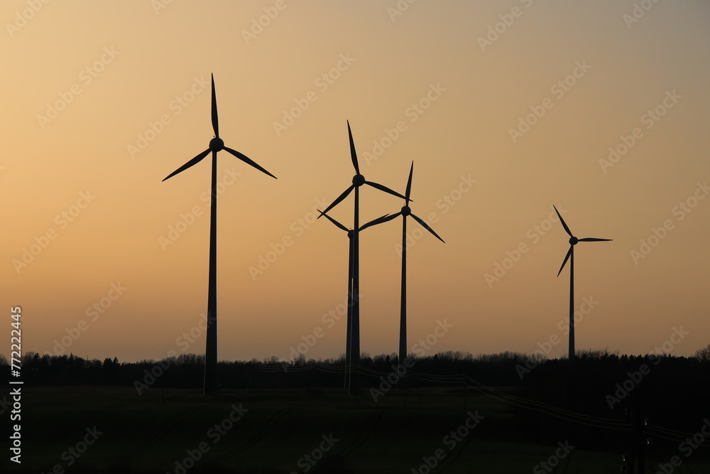 Fototapeta premium wind turbines at sunset