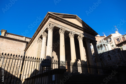 Ancient roman temple facade with columns photo