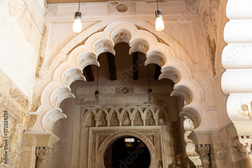 Intricate arabesque designs in aljafer√≠a palace