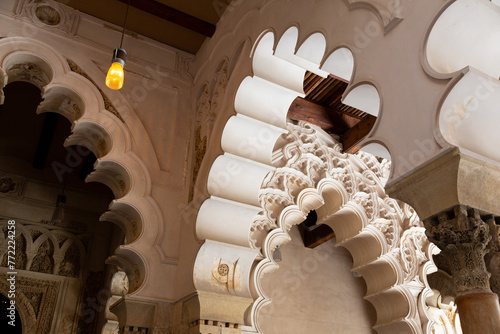 Intricate arabesque designs in aljafer√≠a palace