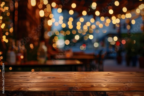 Image of wooden table in front of abstract blurred restaurant lights background - generative ai photo
